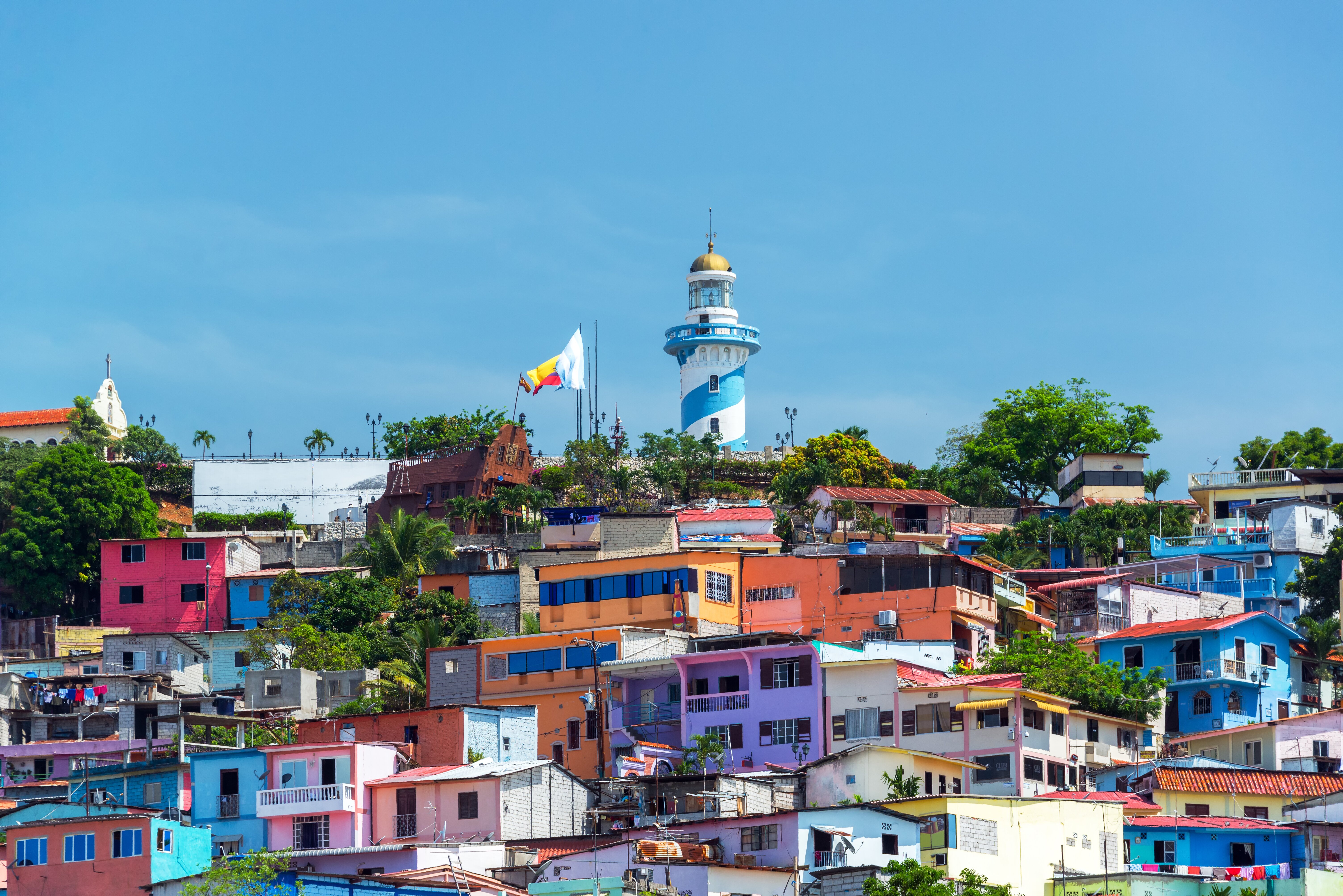 View of Santa Ana hill and the Las Penas neighborhood in Guayaquil, Ecuador with a lighthouse on top